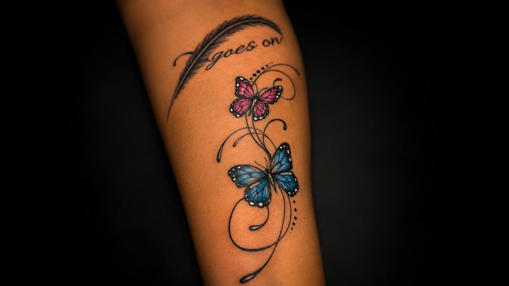Colourful butterfly tattoo by Jay at Inking Tattoos