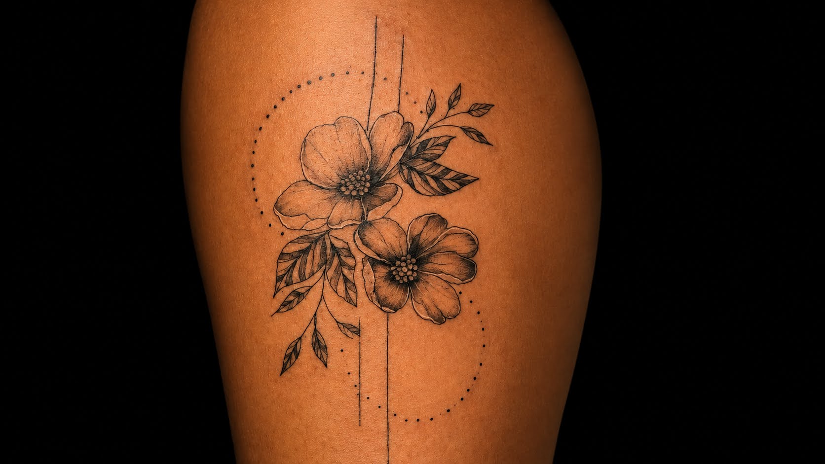 Fine-line floral tattoo by Jay at Inking Tattoos