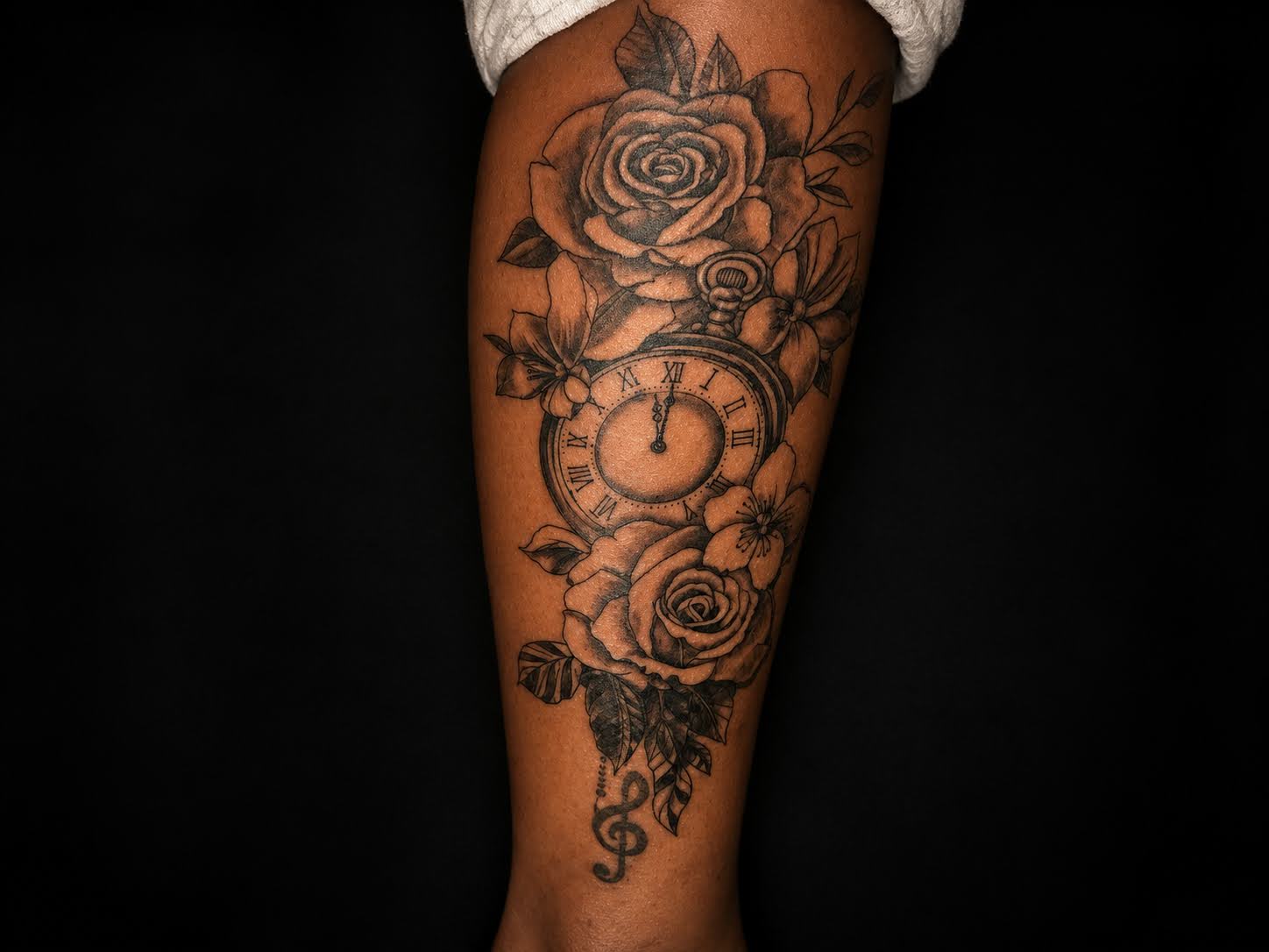 Floral pocket watch tattoo by Jay at Inking Tattoos